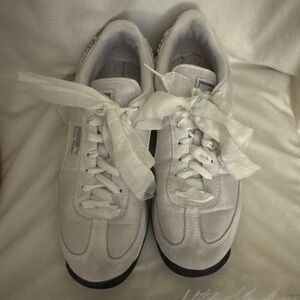 Puma white trainers